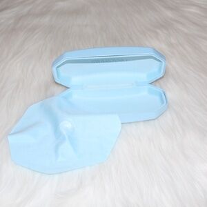 Swarovski, baby blue hard shell glass case with lens cloth